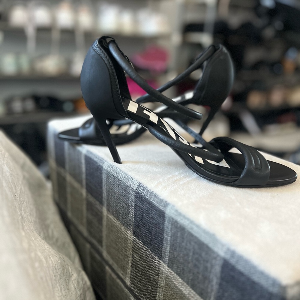 Refurbished/cleaned.Diesel Women's Black and White Sandal SIZE 8